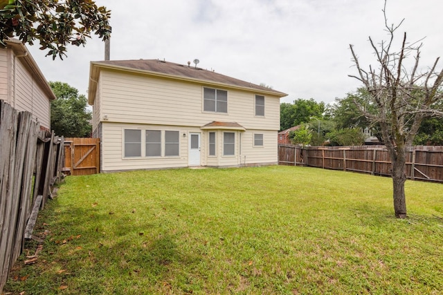 5911 Drenner Park Ln, Houston, TX 77086 - rear view of property with a fenced backyard
