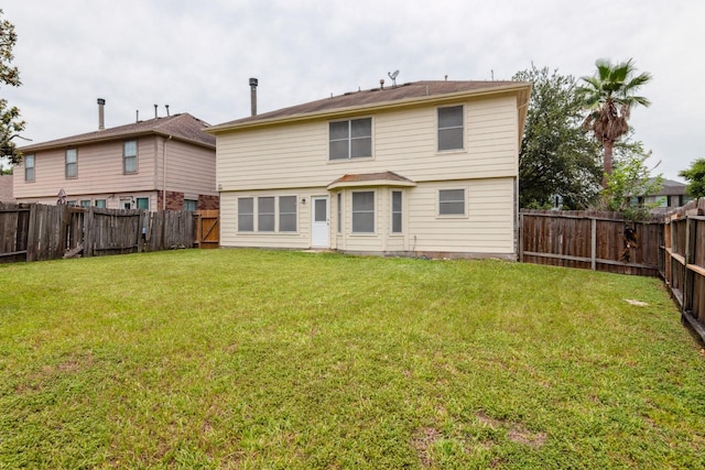 5911 Drenner Park Ln, Houston, TX 77086 - back of house featuring a fenced backyard