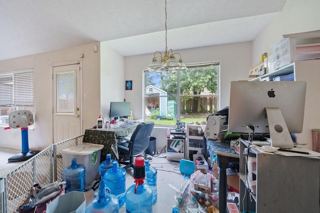 16145 Sun View Ln, Conroe, TX 77302 - office space featuring a chandelier and a textured ceiling