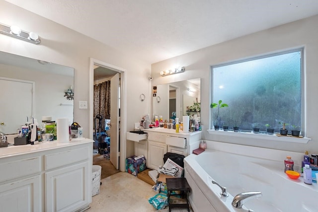 16145 Sun View Ln, Conroe, TX 77302 - full bathroom featuring a garden tub and vanity