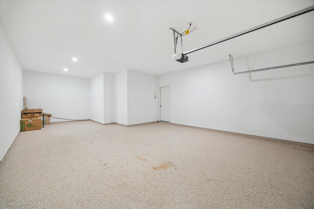 17471 Bayflower, Conroe, TX 77385 - garage with a garage door opener and recessed lighting