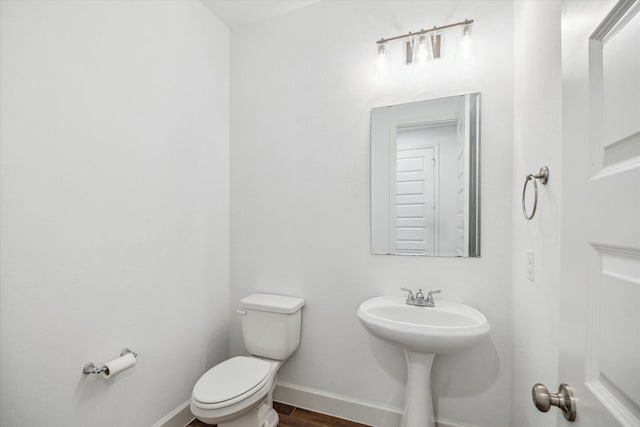 17471 Bayflower, Conroe, TX 77385 - bathroom featuring toilet and wood finished floors