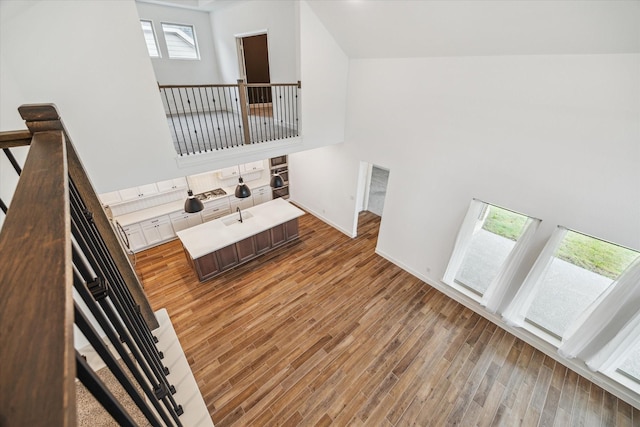 17471 Bayflower, Conroe, TX 77385 - living room featuring a high ceiling and light wood finished floors