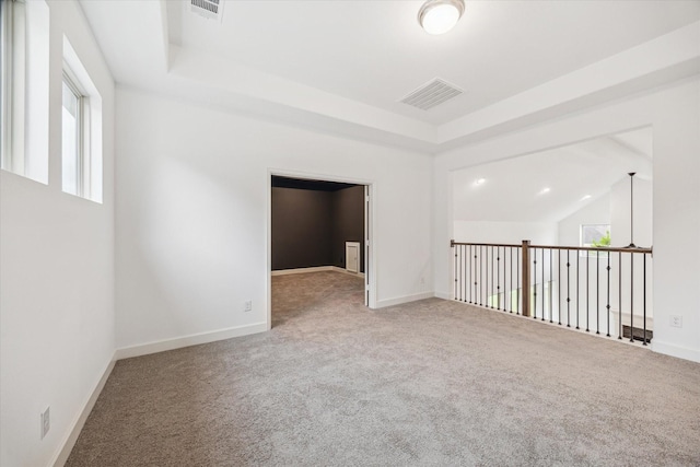 17471 Bayflower, Conroe, TX 77385 - carpeted spare room featuring plenty of natural light and a tray ceiling