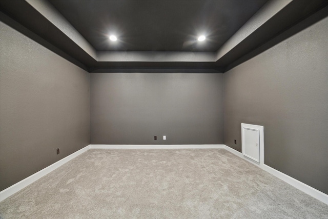 17471 Bayflower, Conroe, TX 77385 - unfurnished room with carpet floors, a raised ceiling, and recessed lighting