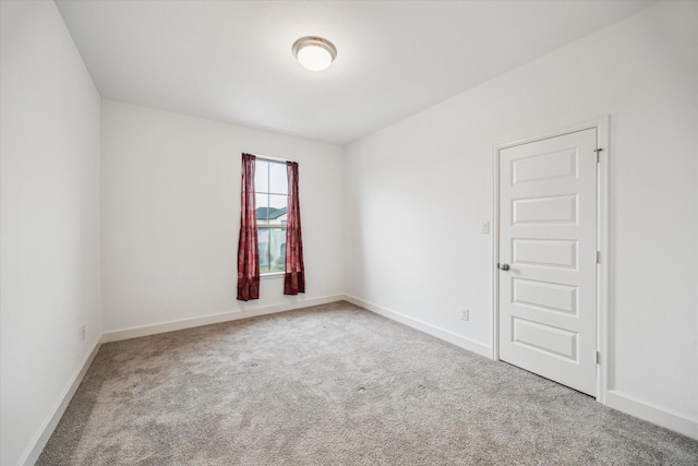 17471 Bayflower, Conroe, TX 77385 - empty room with carpet and baseboards