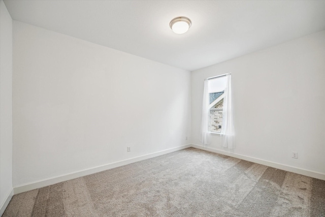 17471 Bayflower, Conroe, TX 77385 - carpeted empty room featuring baseboards