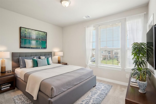 29446 Westhope Dr, Spring, TX 77386 - bedroom featuring multiple windows and light colored carpet