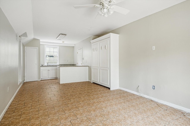 2127 Milford St, Houston, TX 77098 - unfurnished living room featuring a ceiling fan and vaulted ceiling