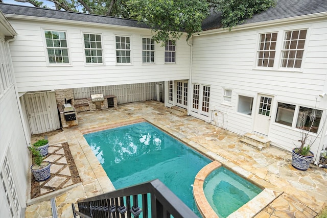 2127 Milford St, Houston, TX 77098 - view of swimming pool featuring a patio, french doors, and a pool with connected hot tub