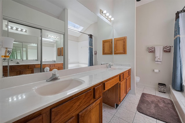 7838 Poitiers Dr, Houston, TX 77071 - full bath with a skylight, double vanity, vaulted ceiling, tile patterned floors, and shower / bath combo with shower curtain