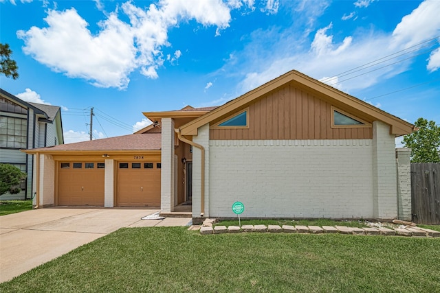 7838 Poitiers Dr, Houston, TX 77071 - view of front of home with brick siding, a garage, and driveway