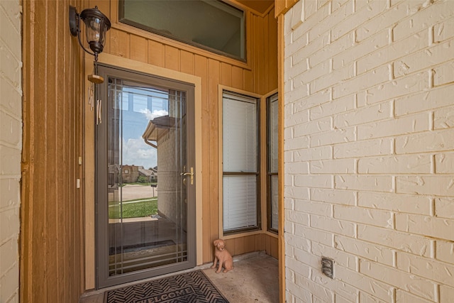 7838 Poitiers Dr, Houston, TX 77071 - doorway to property featuring board and batten siding