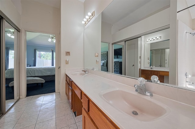7838 Poitiers Dr, Houston, TX 77071 - bathroom featuring ensuite bathroom, double vanity, and tile patterned floors