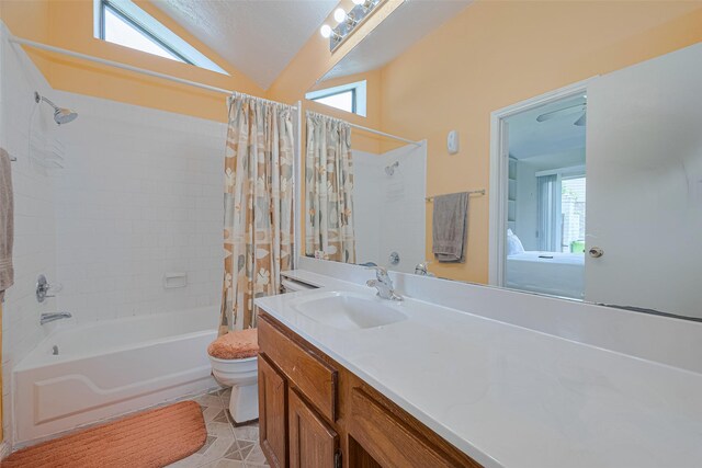 7838 Poitiers Dr, Houston, TX 77071 - full bathroom with shower / bath combo with shower curtain, vanity, tile patterned flooring, lofted ceiling, and ensuite bathroom
