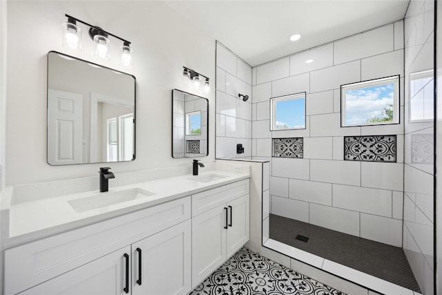3210 Retta St A-B, Unit A-B Houston, TX 77026 - full bathroom featuring a walk in shower, double vanity, and tile patterned flooring