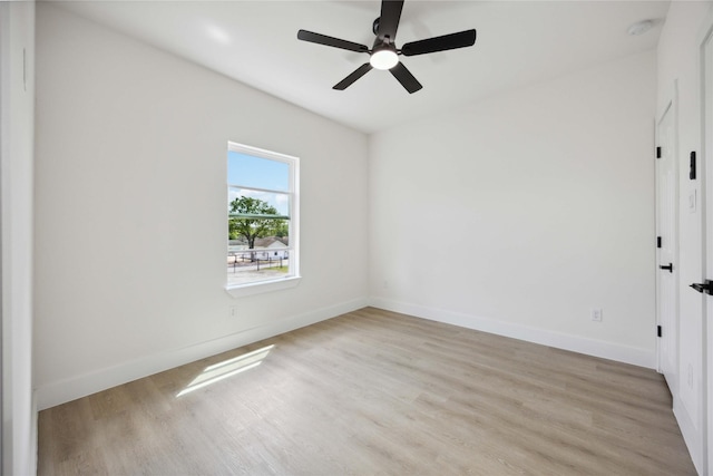 3210 Retta St A-B, Unit A-B Houston, TX 77026 - empty room featuring light wood-type flooring, a ceiling fan, and a smoke detector