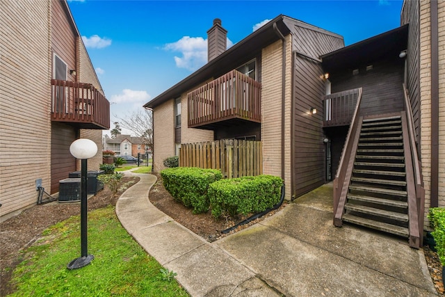 12905 Woodforest Blvd Unit 202, Houston, TX 77015 - view of building exterior with stairway