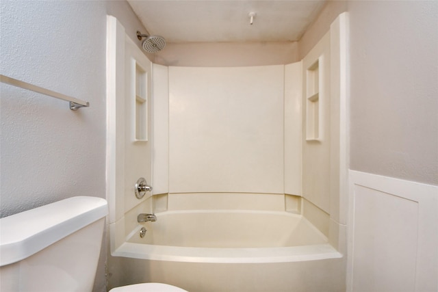 12905 Woodforest Blvd Unit 202, Houston, TX 77015 - bathroom featuring bathing tub / shower combination and a textured wall