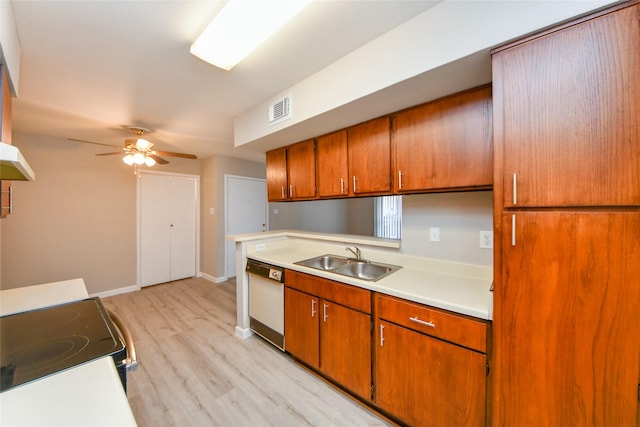 12905 Woodforest Blvd Unit 202, Houston, TX 77015 - kitchen featuring dishwasher, light countertops, light wood-style flooring, brown cabinets, and ceiling fan
