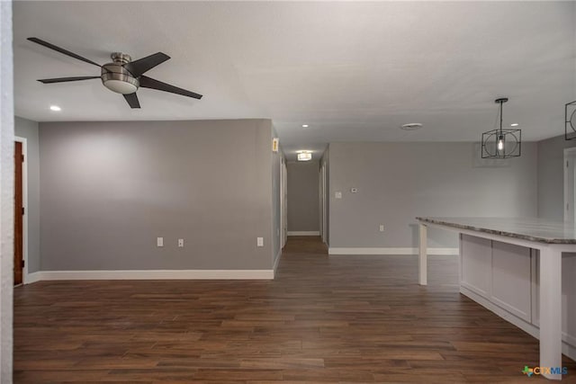 248 Park Rd, Port Lavaca, TX 77979 - spare room with a ceiling fan, dark wood-style floors, and recessed lighting