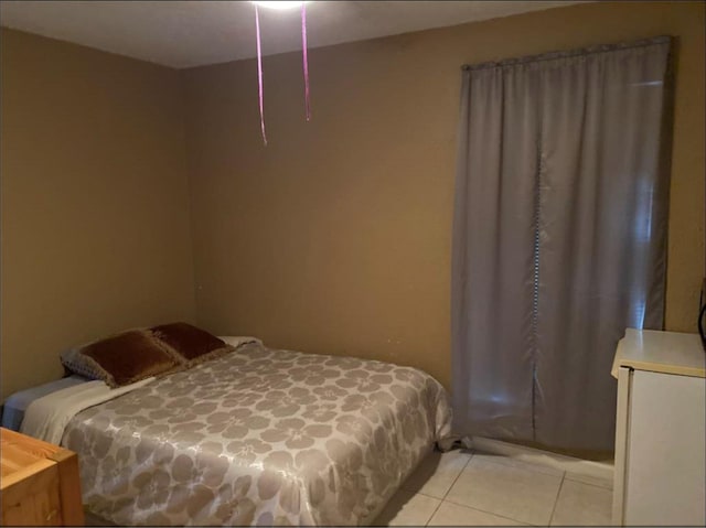 439 Terminal St, Houston, TX 77020 - bedroom with light tile patterned floors