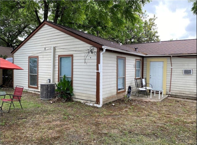 439 Terminal St, Houston, TX 77020 - back of house featuring a patio and roof with shingles