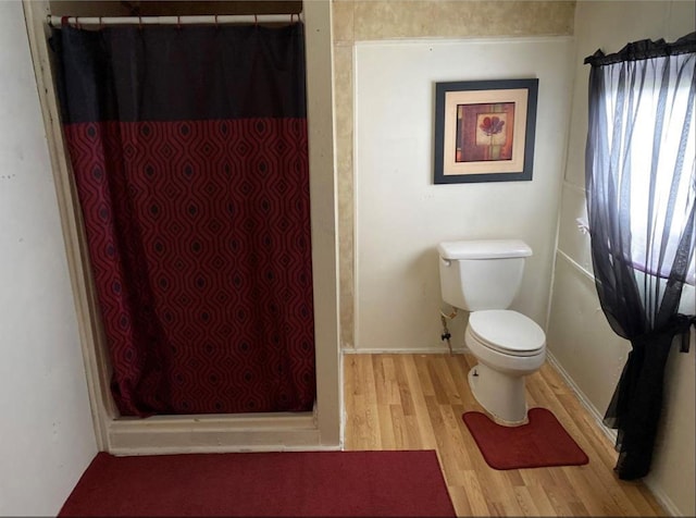 439 Terminal St, Houston, TX 77020 - full bathroom with wood finished floors and a stall shower