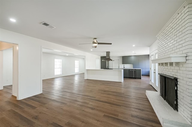 52 Oyster Creek Ct, Lake Jackson, TX 77566 - unfurnished living room featuring a fireplace, ceiling fan, dark wood-style floors, and recessed lighting