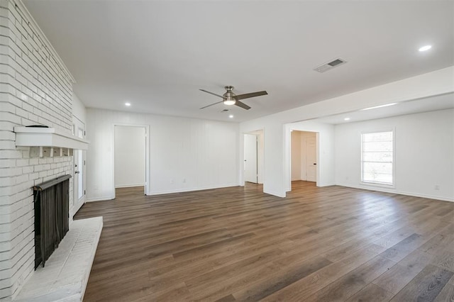 52 Oyster Creek Ct, Lake Jackson, TX 77566 - unfurnished living room with a ceiling fan, a brick fireplace, wood finished floors, and recessed lighting