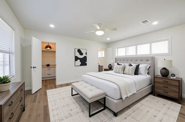52 Oyster Creek Ct, Lake Jackson, TX 77566 - bedroom with light wood finished floors, ceiling fan, and recessed lighting