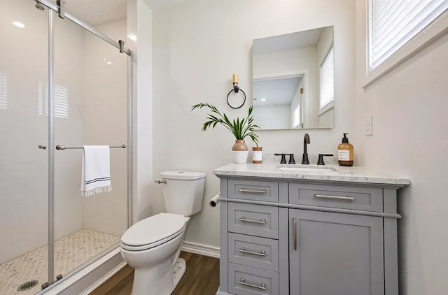 52 Oyster Creek Ct, Lake Jackson, TX 77566 - full bathroom with vanity, wood finished floors, and a shower stall