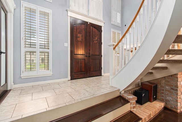 8706 Ashridge Park Dr, Spring, TX 77379 - foyer with stairs and a towering ceiling