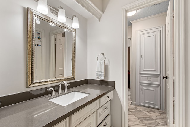 8706 Ashridge Park Dr, Spring, TX 77379 - bathroom with vanity, crown molding, and marble finish floors