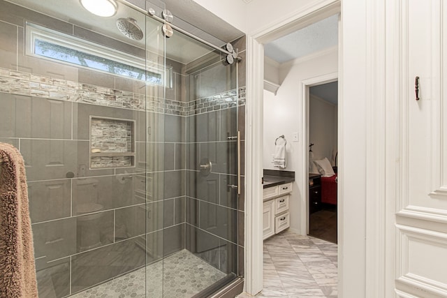 8706 Ashridge Park Dr, Spring, TX 77379 - bathroom featuring connected bathroom, a shower stall, and crown molding