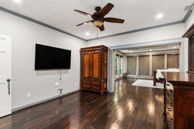 8706 Ashridge Park Dr, Spring, TX 77379 - living room featuring a ceiling fan, dark wood-type flooring, ornamental molding, and recessed lighting