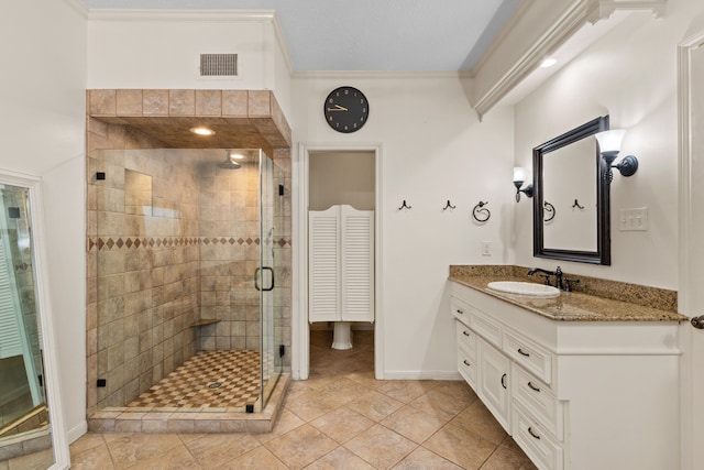 8706 Ashridge Park Dr, Spring, TX 77379 - bathroom with vanity, a stall shower, ornamental molding, a closet, and tile patterned flooring