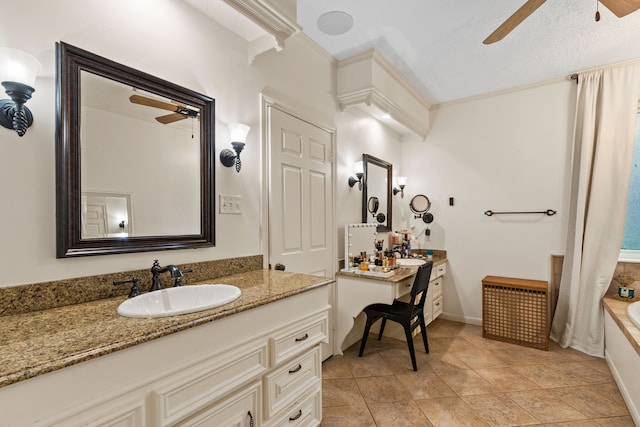 8706 Ashridge Park Dr, Spring, TX 77379 - full bath featuring a ceiling fan, two vanities, a tub to relax in, and tile patterned floors