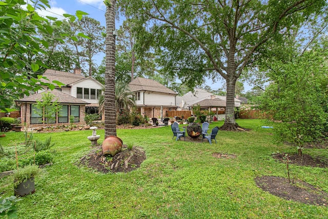 8706 Ashridge Park Dr, Spring, TX 77379 - view of yard featuring an outdoor fire pit and a gazebo