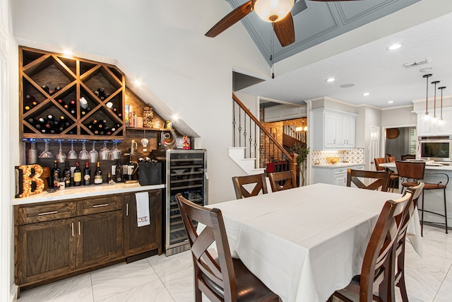 8706 Ashridge Park Dr, Spring, TX 77379 - dining area featuring wine cooler, light marble finish floors, a ceiling fan, stairway, and a bar