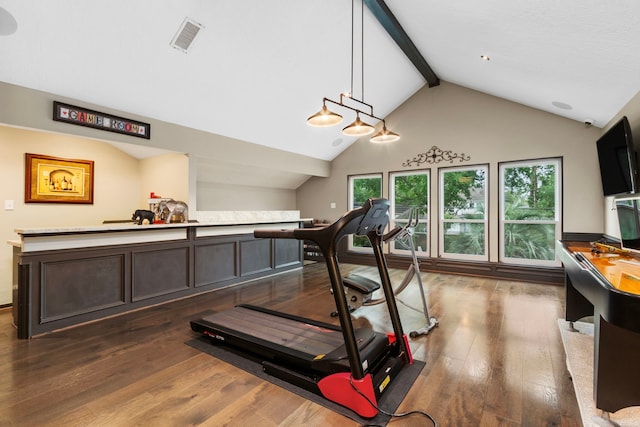 8706 Ashridge Park Dr, Spring, TX 77379 - workout room with vaulted ceiling and dark wood-type flooring