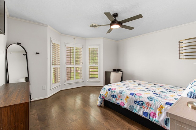 8706 Ashridge Park Dr, Spring, TX 77379 - bedroom featuring wood finished floors, crown molding, a textured ceiling, and ceiling fan
