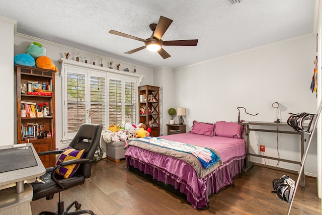 8706 Ashridge Park Dr, Spring, TX 77379 - bedroom with hardwood / wood-style flooring, ornamental molding, a textured ceiling, a desk, and a ceiling fan