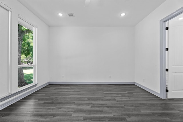 29 Westwood Dr W, Trinity, TX 75862 - unfurnished room featuring dark wood-type flooring and recessed lighting