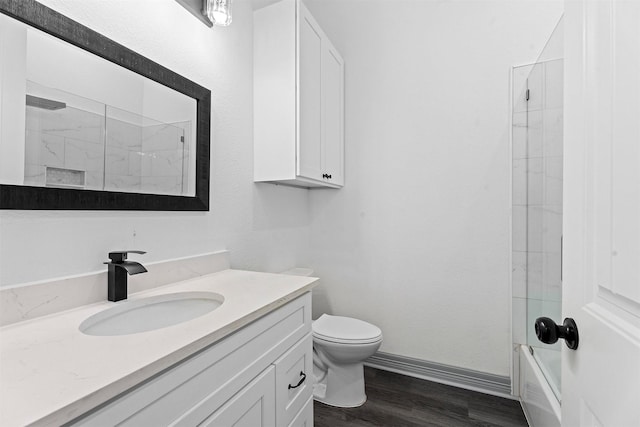 29 Westwood Dr W, Trinity, TX 75862 - bathroom with vanity, wood finished floors, and shower / washtub combination