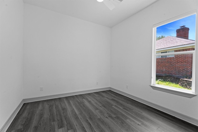 29 Westwood Dr W, Trinity, TX 75862 - spare room featuring dark wood finished floors and baseboards