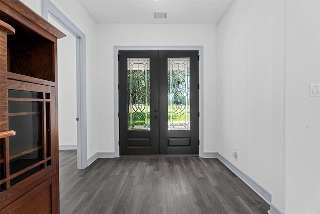 29 Westwood Dr W, Trinity, TX 75862 - entryway with french doors and dark wood finished floors