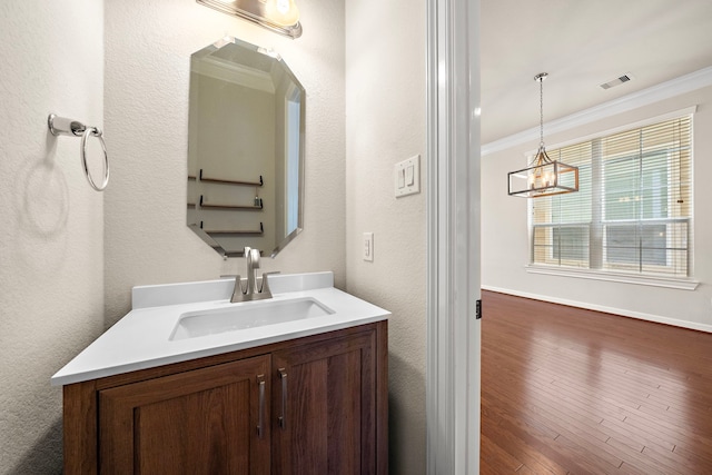 878 Fisher St, Houston, TX 77018 - bathroom with vanity, crown molding, and wood finished floors