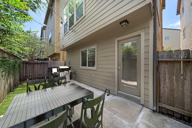 878 Fisher St, Houston, TX 77018 - fenced backyard featuring outdoor dining space, a patio area, and area for grilling