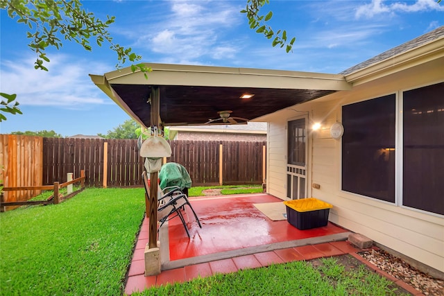 394 Sherandoe Ln, Alvin, TX 77511 - fenced backyard with a ceiling fan and a patio